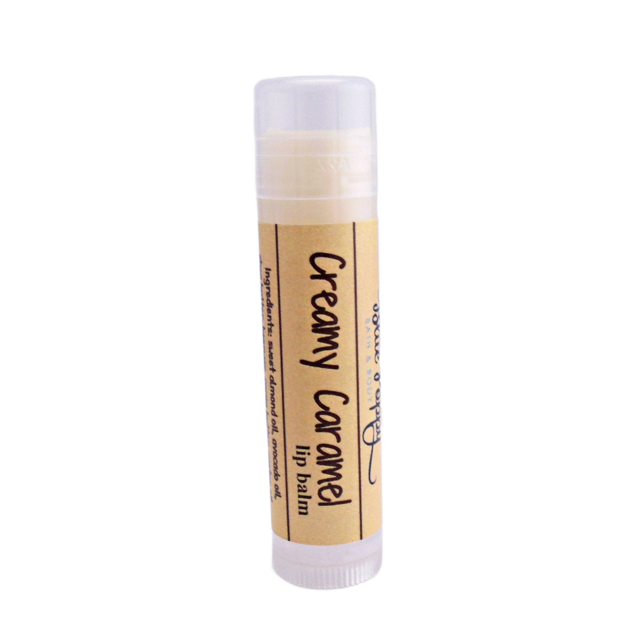 Lip balm tube with beige label, Creamy Caramel text, and BluePoppyBath logo