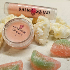 Lip balm with pink and clear packaging, watermelon flavor, and BalmSquadBeauty branding