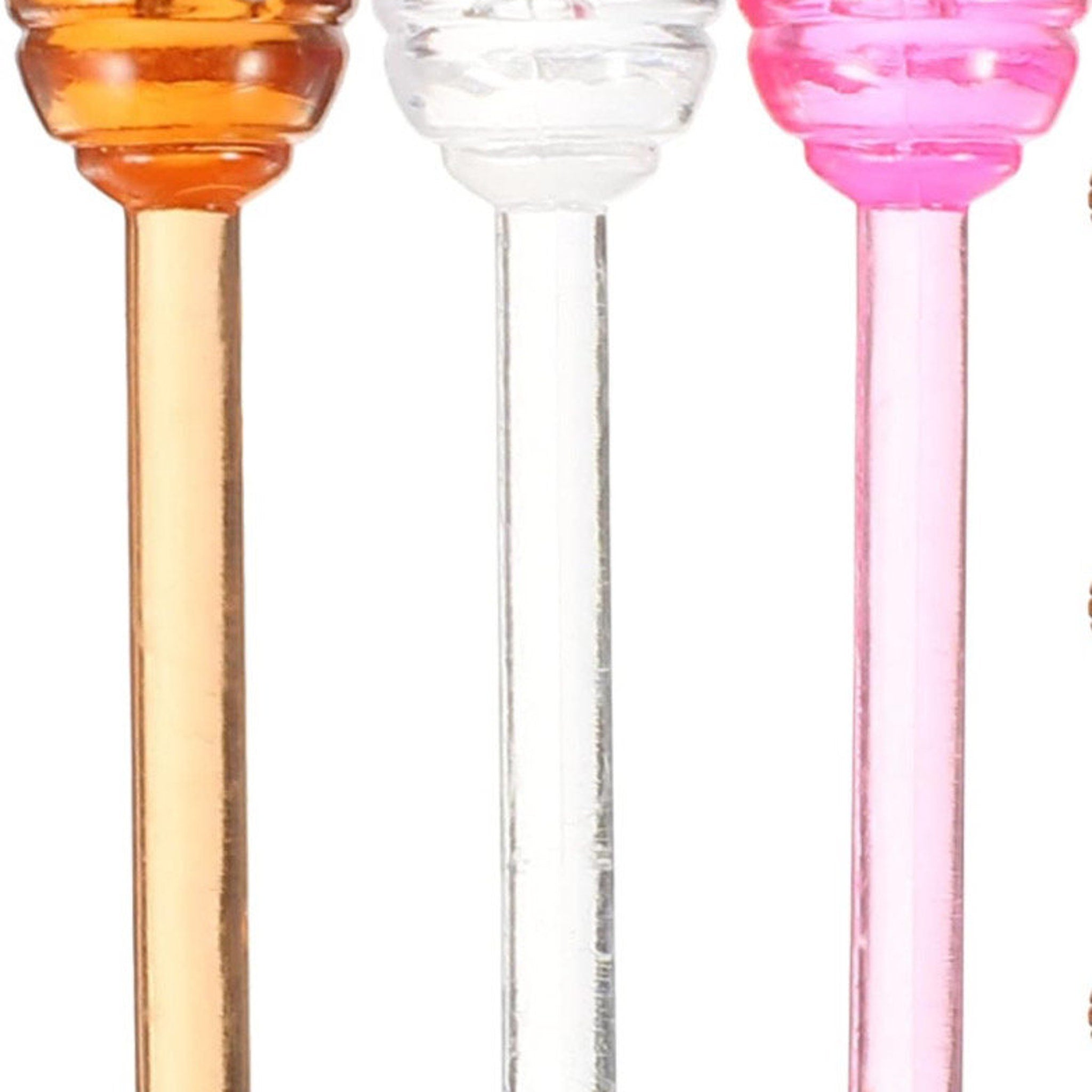 Colored glass sticks with orange, clear, and pink tops and clear stems