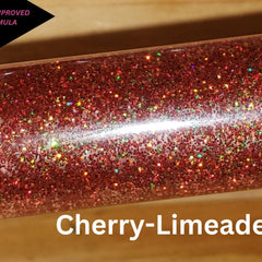 Glitter tube with red glitter and multi-colored sparkles, "Cherry-Limeade" text visible