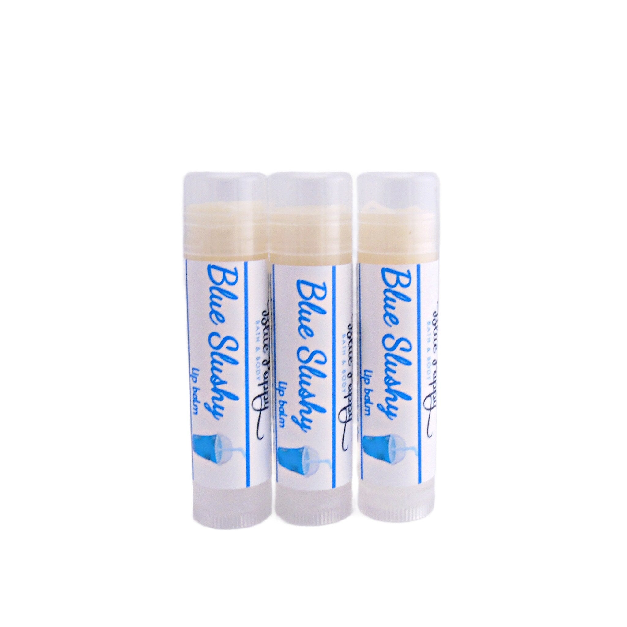 Lip balm tubes with white and blue labels, clear plastic tube, and light yellow balm inside