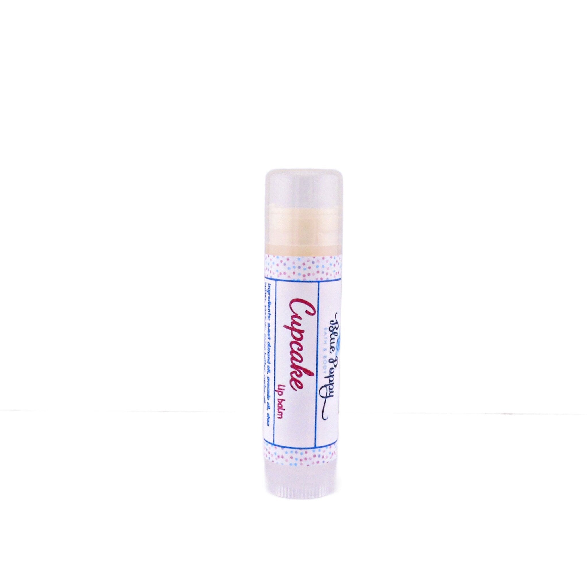 Lip balm tube with white, blue polka dot pattern, and Blue Poppy text label