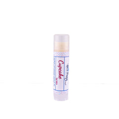Lip balm tube with white, blue polka dot pattern, and Blue Poppy text label