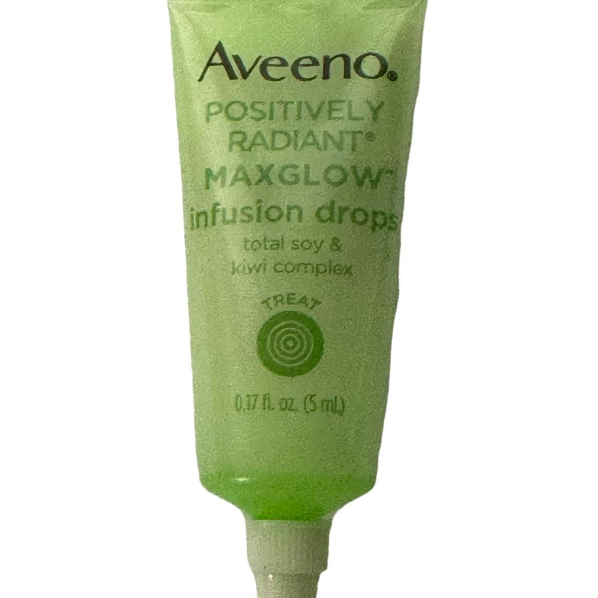 Infusion drops tube, green and white, Aveeno brand, with text and logo visible