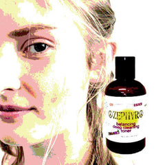 Toner bottle with black cap and white label, next to a face with visible eye and hair