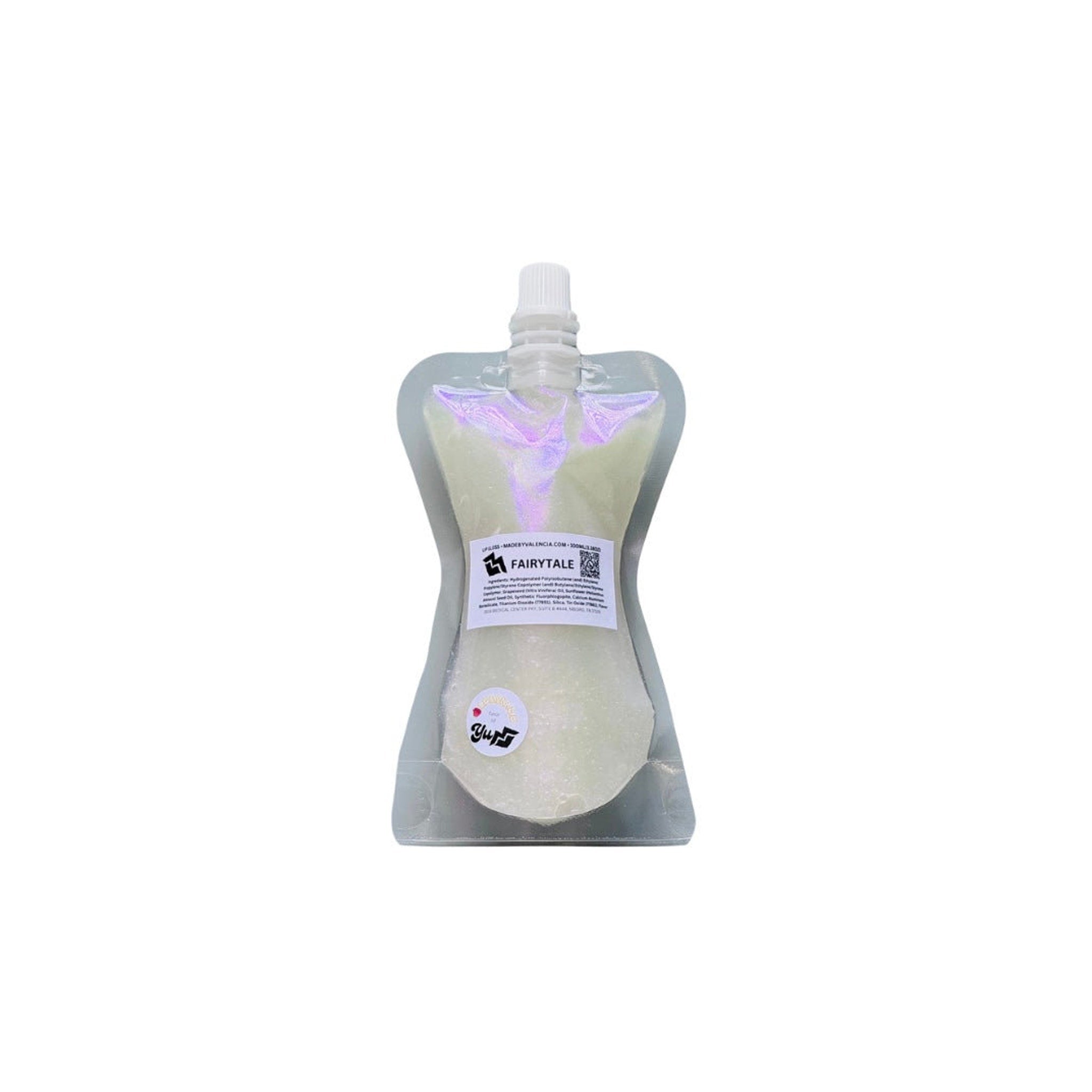 Clear plastic pouch with white cap, Fairytale label, and white liquid inside