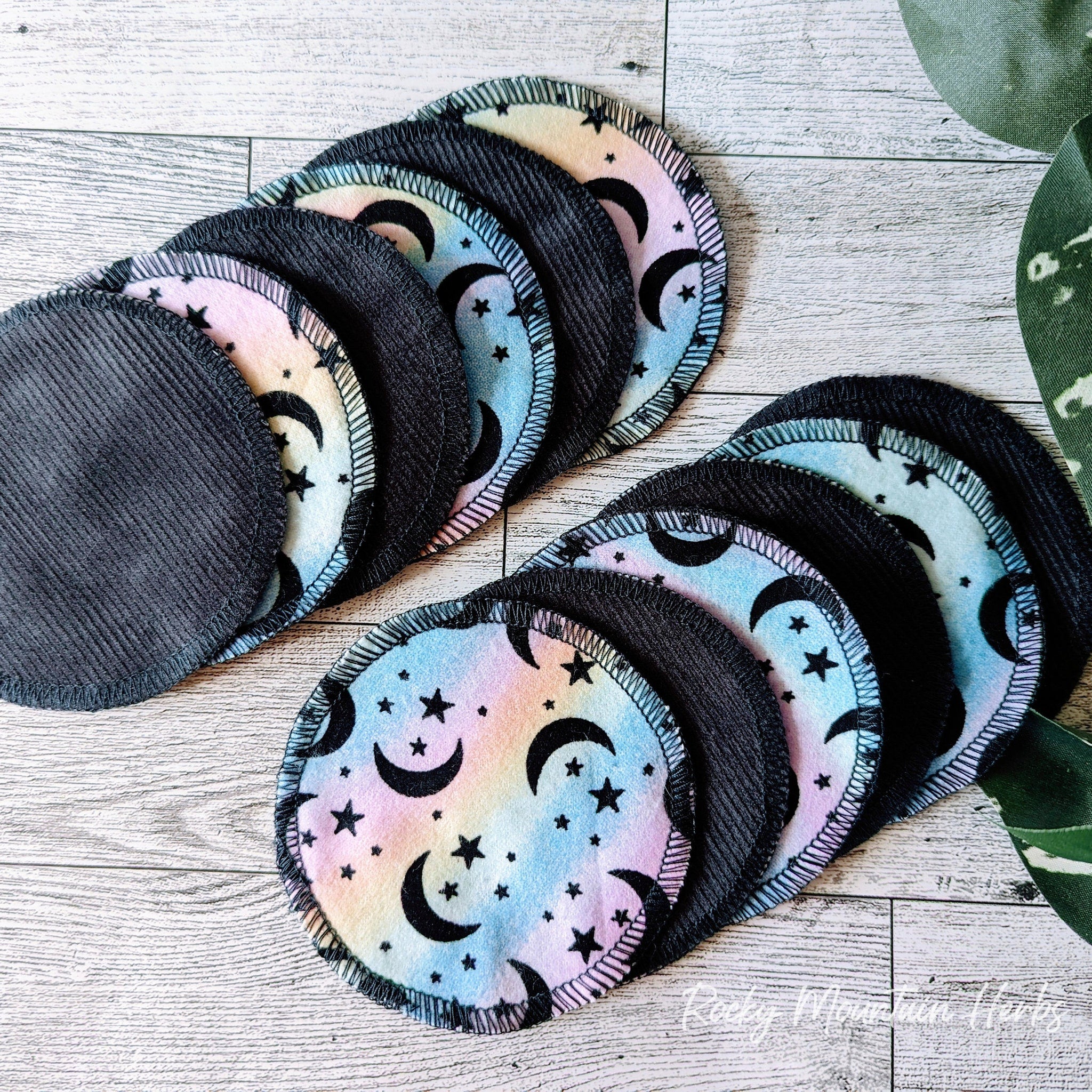 Reusable facial rounds with black corduroy and moon and star pattern, pastel colors