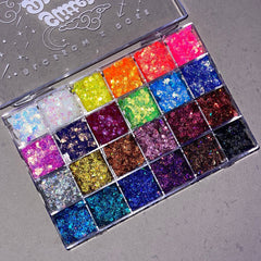 Close-up of 24 glitter gel eyeshadow shades in a palette with bold black sparkles and creamy textures