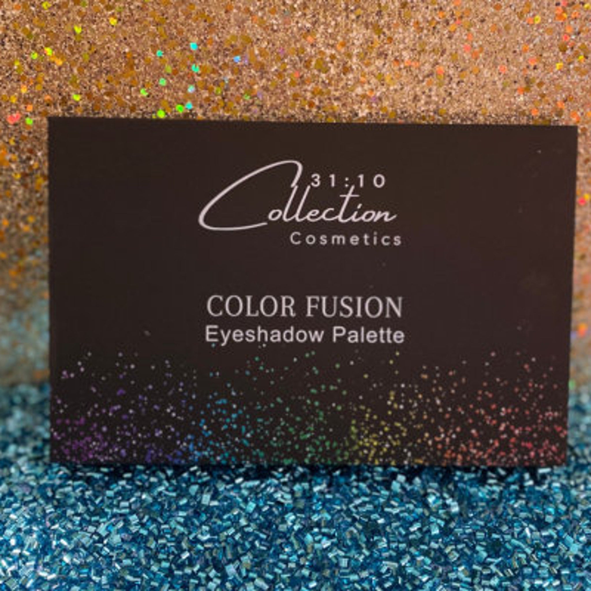 Close-up of fingertips applying shimmery peach and gold vegan eyeshadow with glitter particles on eyelid.
