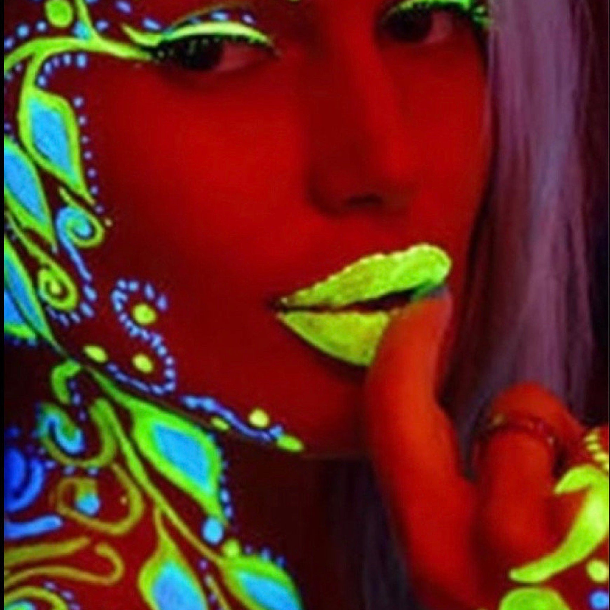 Seven vibrant neon matte eyeshadows in round pans with UV glow pigments for face and body