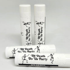 Lip balm tubes with white and black skeleton design, "Till Death Do Us Party" text, and Spearmint label