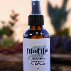 Facial toner bottle with brown glass, black cap, and white label with MuiMui skincare text