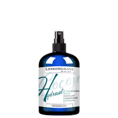Lemongrass hydrosol spray bottle, blue glass bottle, black spray top, white label with text.