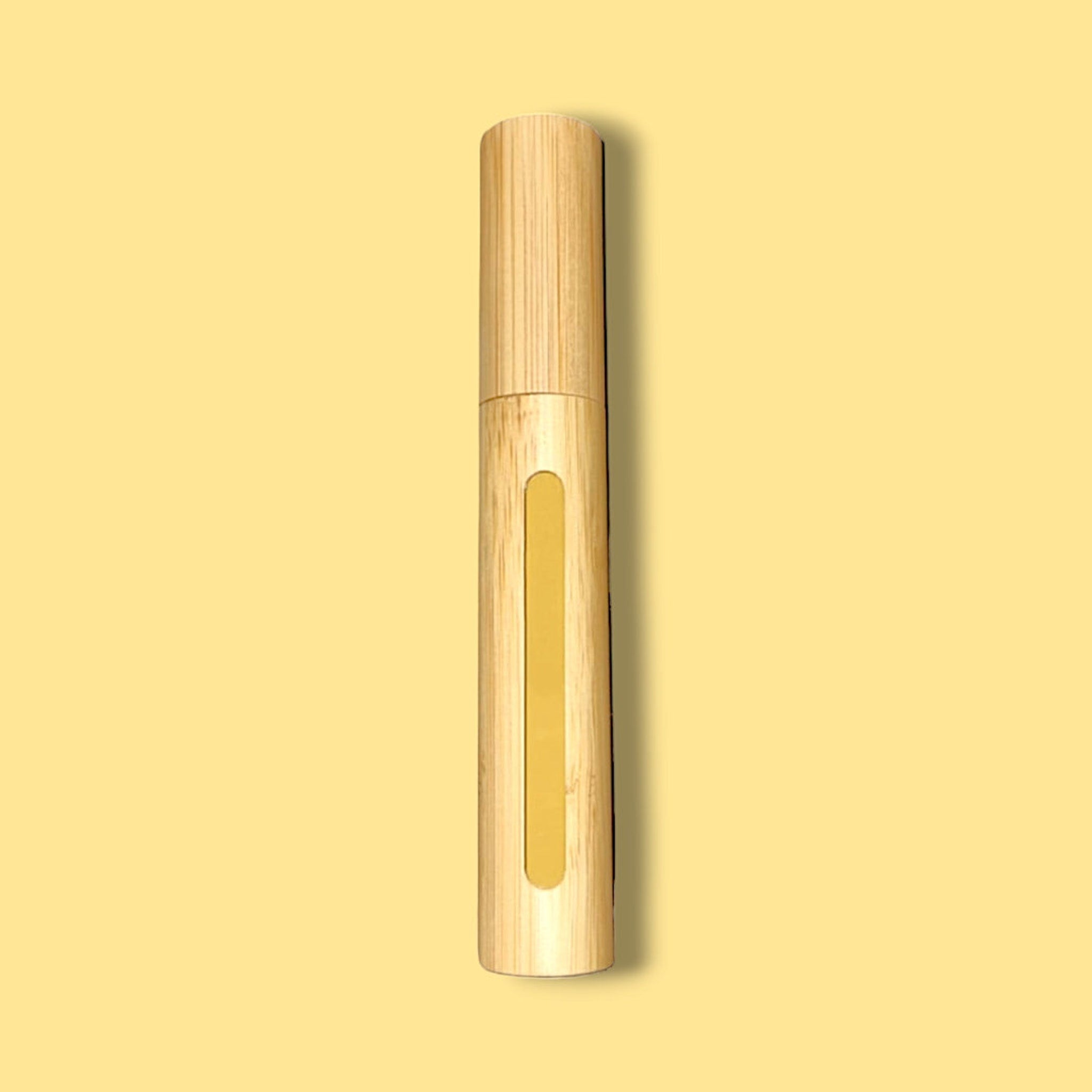 Bamboo tube with light brown wood grain and yellow center panel, vertical design