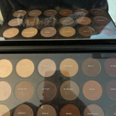 Close-up of Morphe Eye Shadow Palette showing vibrant matte and shimmer shades in a sleek black case
