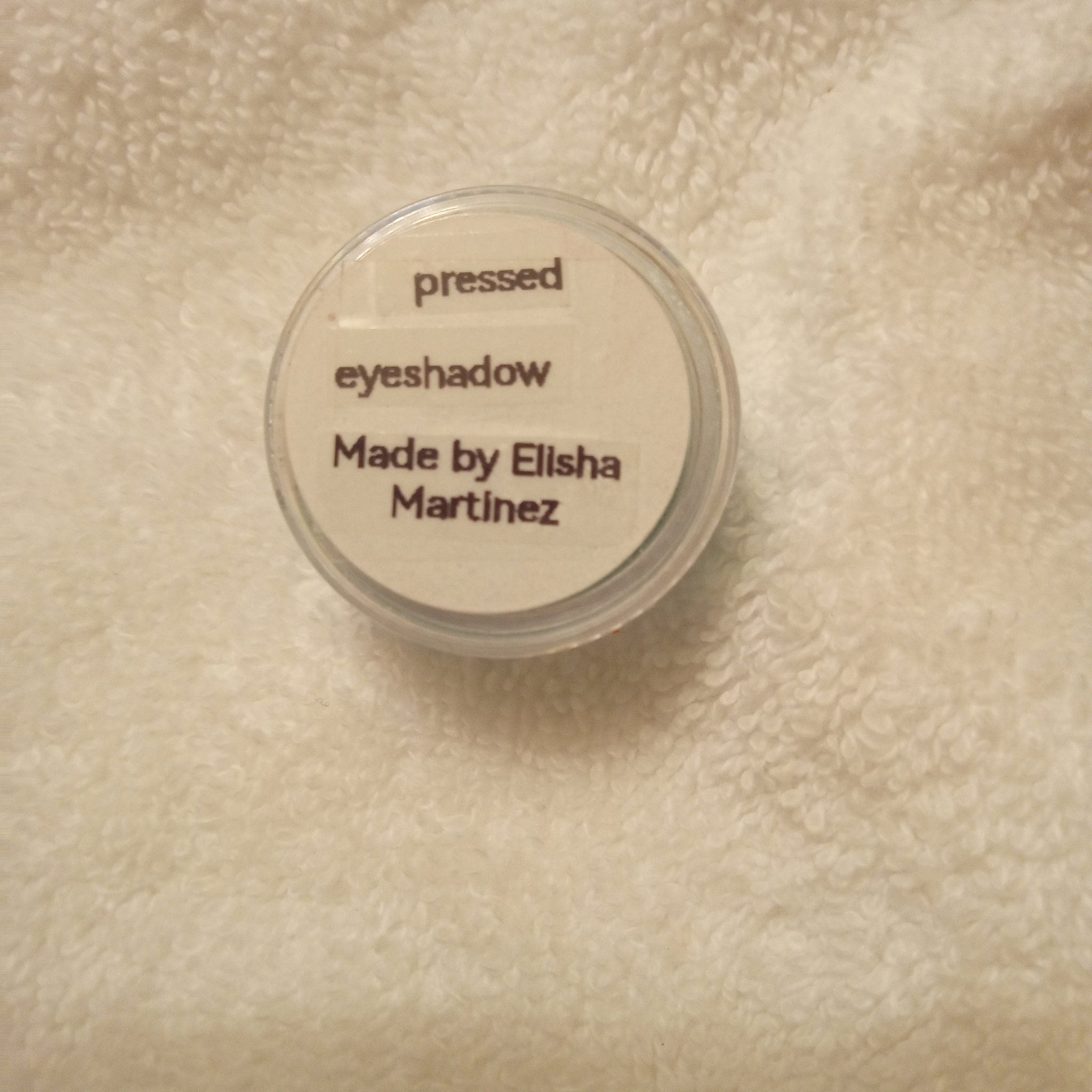 Pressed powder eye shadow palette with bonus travel mirror inside compact case