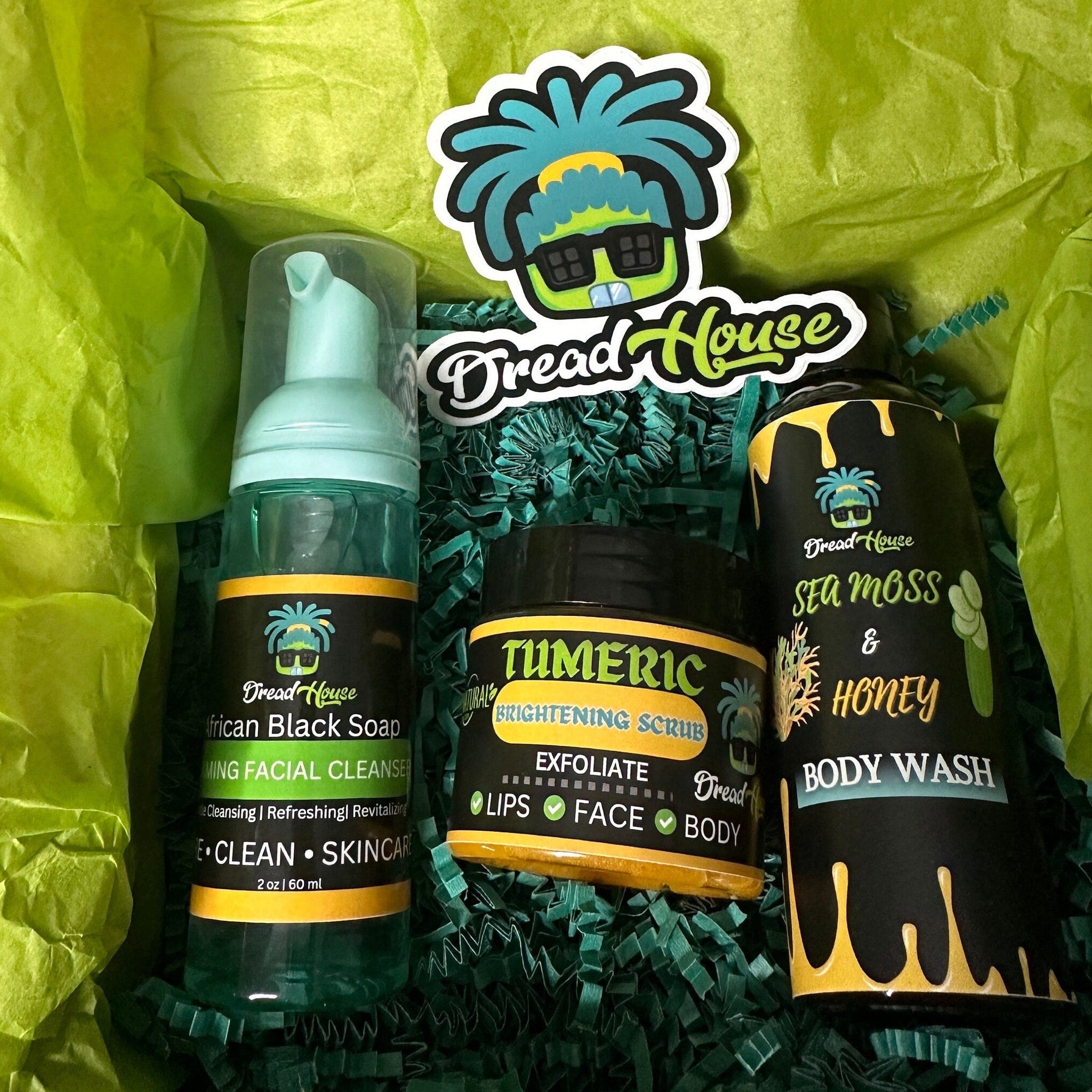Facial Cleansers with African Black Soap in clear bottle, yellow label, Dread House brand