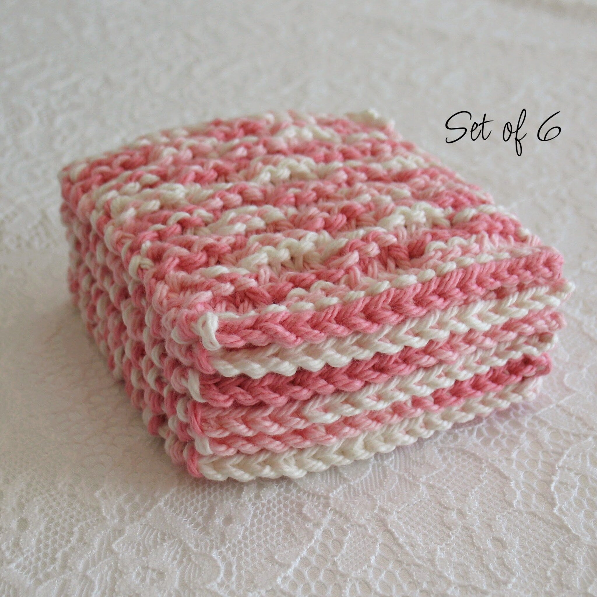 Knitted washcloths in pink and white stripes, set of 6, visible texture and layers