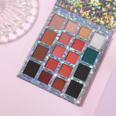Eyeshadow palette with holographic glitter case, various colors, and Prolux brand name