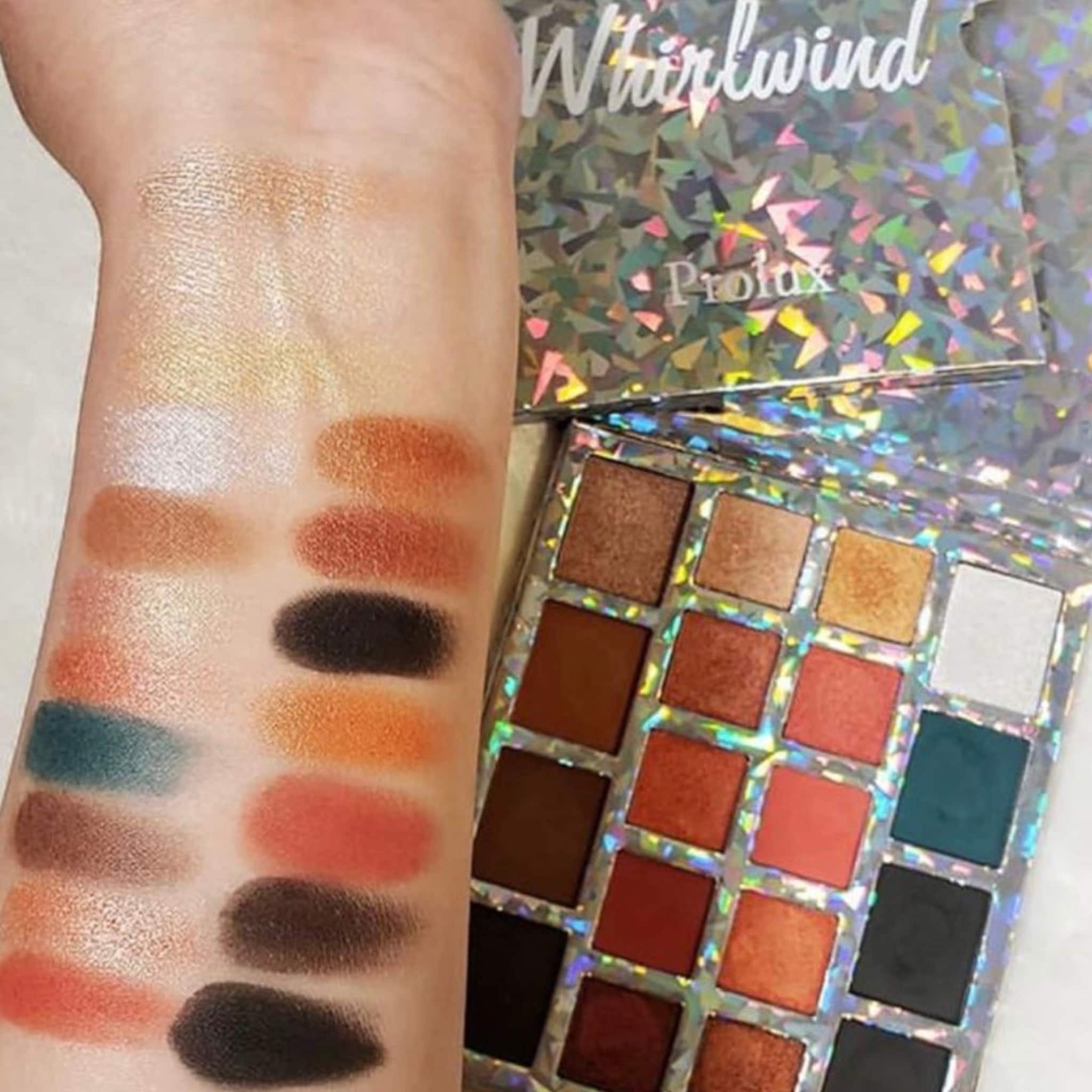 Eyeshadow palette with Prolux brand, various colors and square pan style