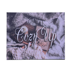 Cozy Up print with white script, neutral colors, and Prolux brand text on a blanket background
