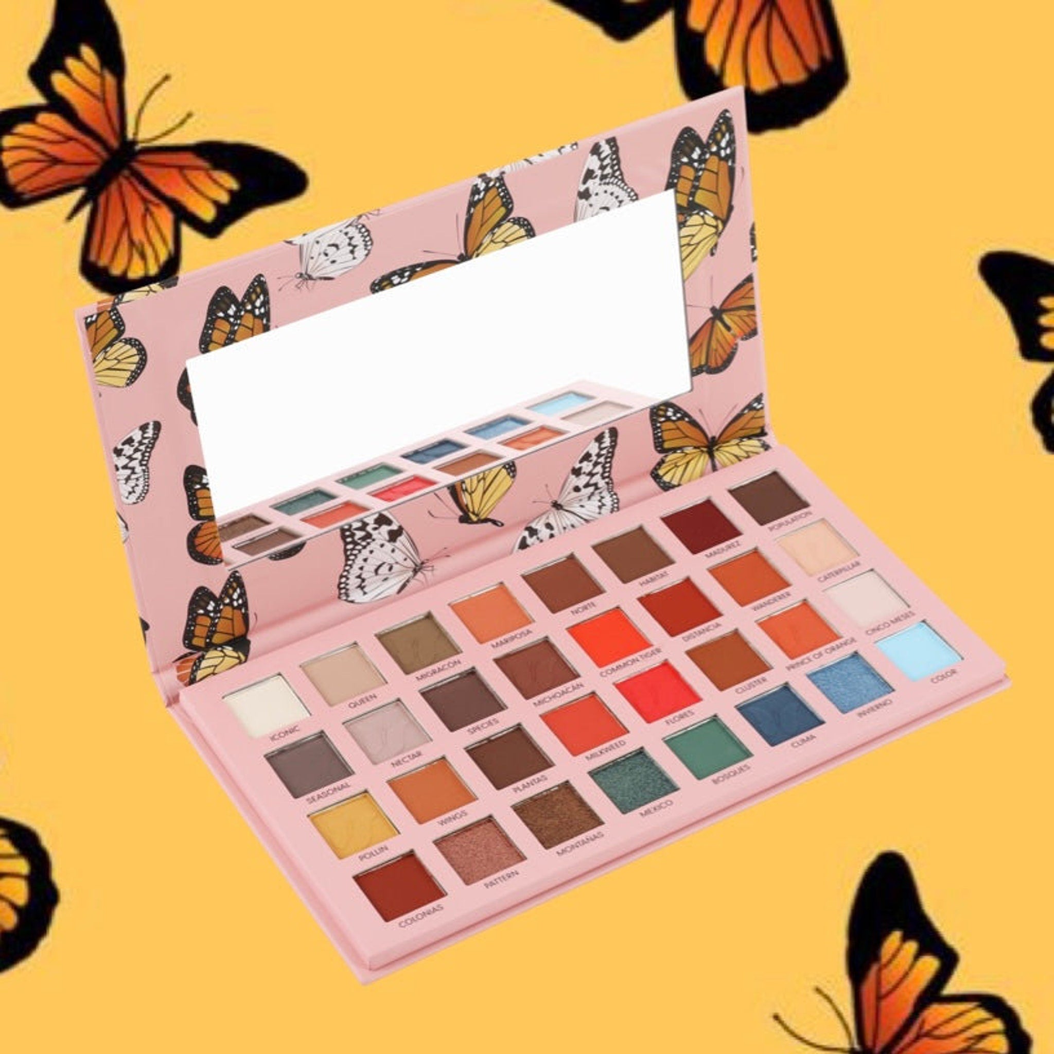 Eyeshadow palette with pink case, butterfly pattern, and various color shades inside