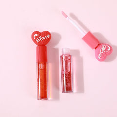 PXLOOK Love Lip Gloss in a sleek transparent tube with pink cap and glossy finish
