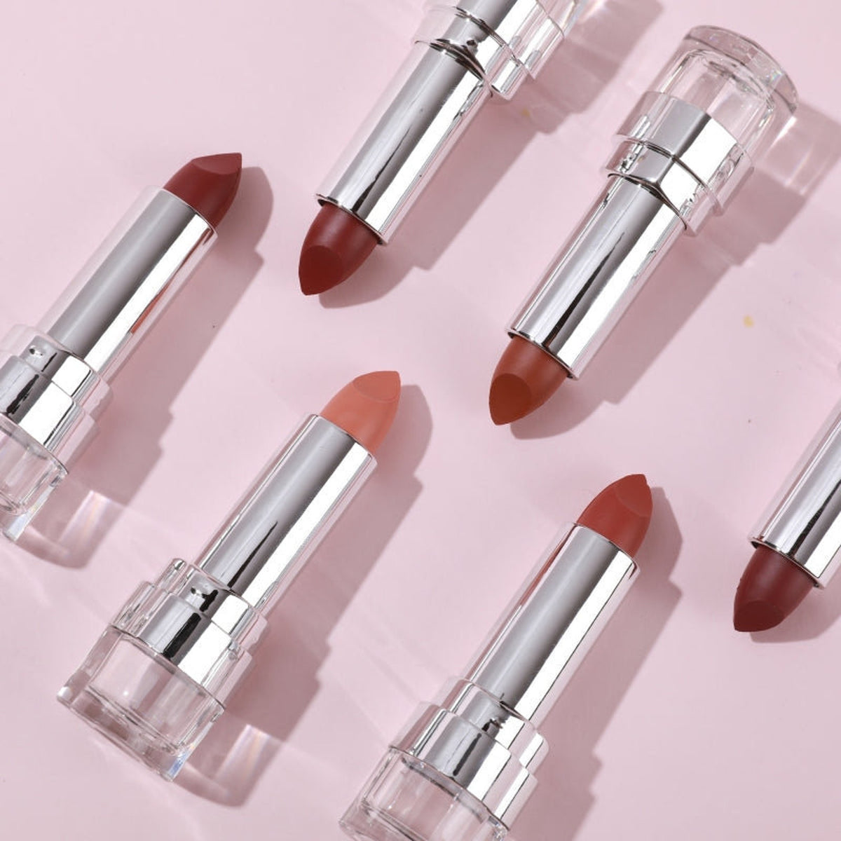 PXLOOK Pout About Lipstick in sleek black tube with gold accents, showcasing bullet shape and satin finish