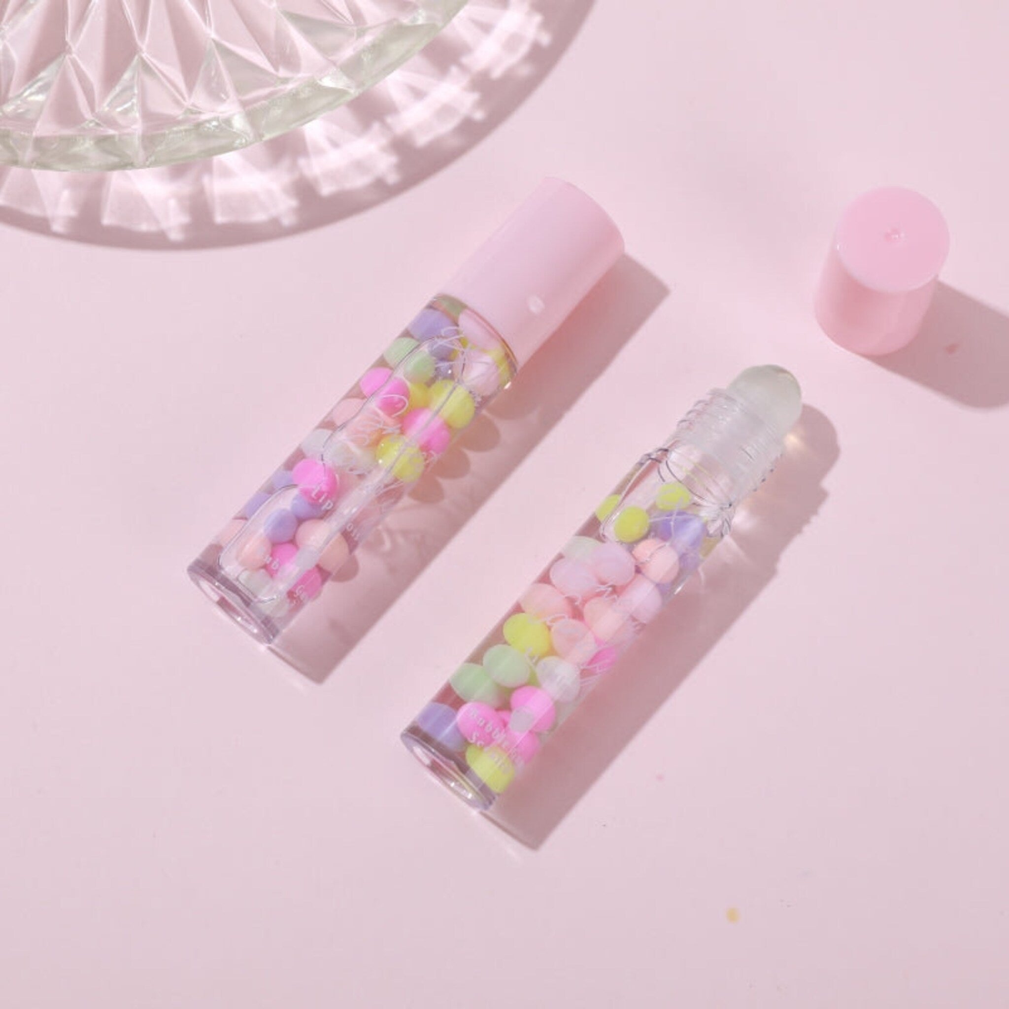 PxLook Sweet Candy Lip Gloss in a clear tube with pink cap and shiny liquid formula visible inside