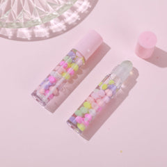 PxLook Sweet Candy Lip Gloss in a clear tube with pink cap and shiny liquid formula visible inside