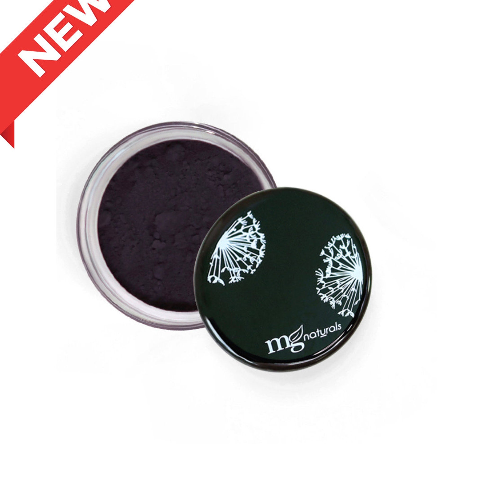 Close-up of vegan mineral eyeshadow pan showing soft matte texture in natural earth tone
