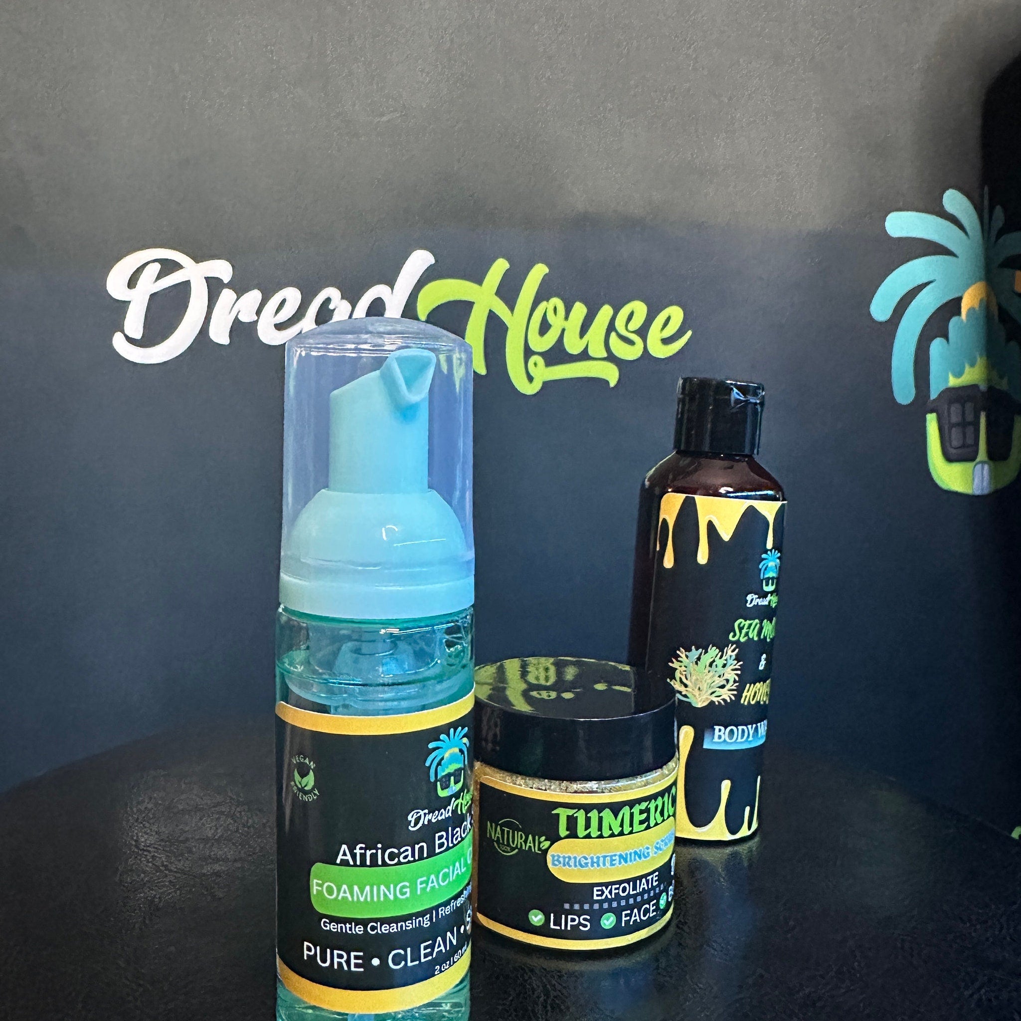 Foaming facial cleanser with blue pump, black and green label, and clear bottle, Dread House brand