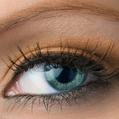 Eye with blue iris, dark eyelashes, and light skin tone around the eye