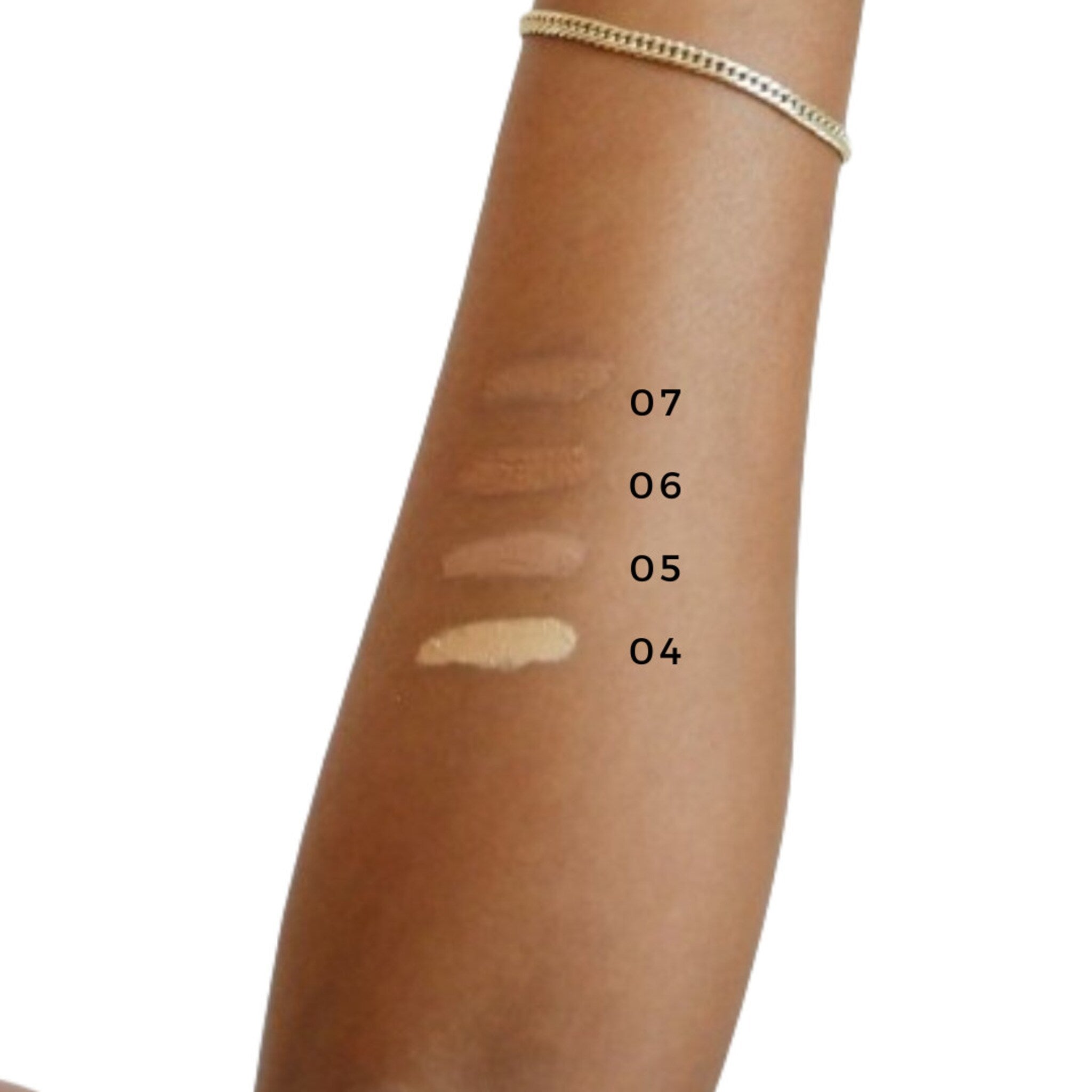 Side view of vegan zero waste concealer in matte nude shade with minimalist cardboard packaging