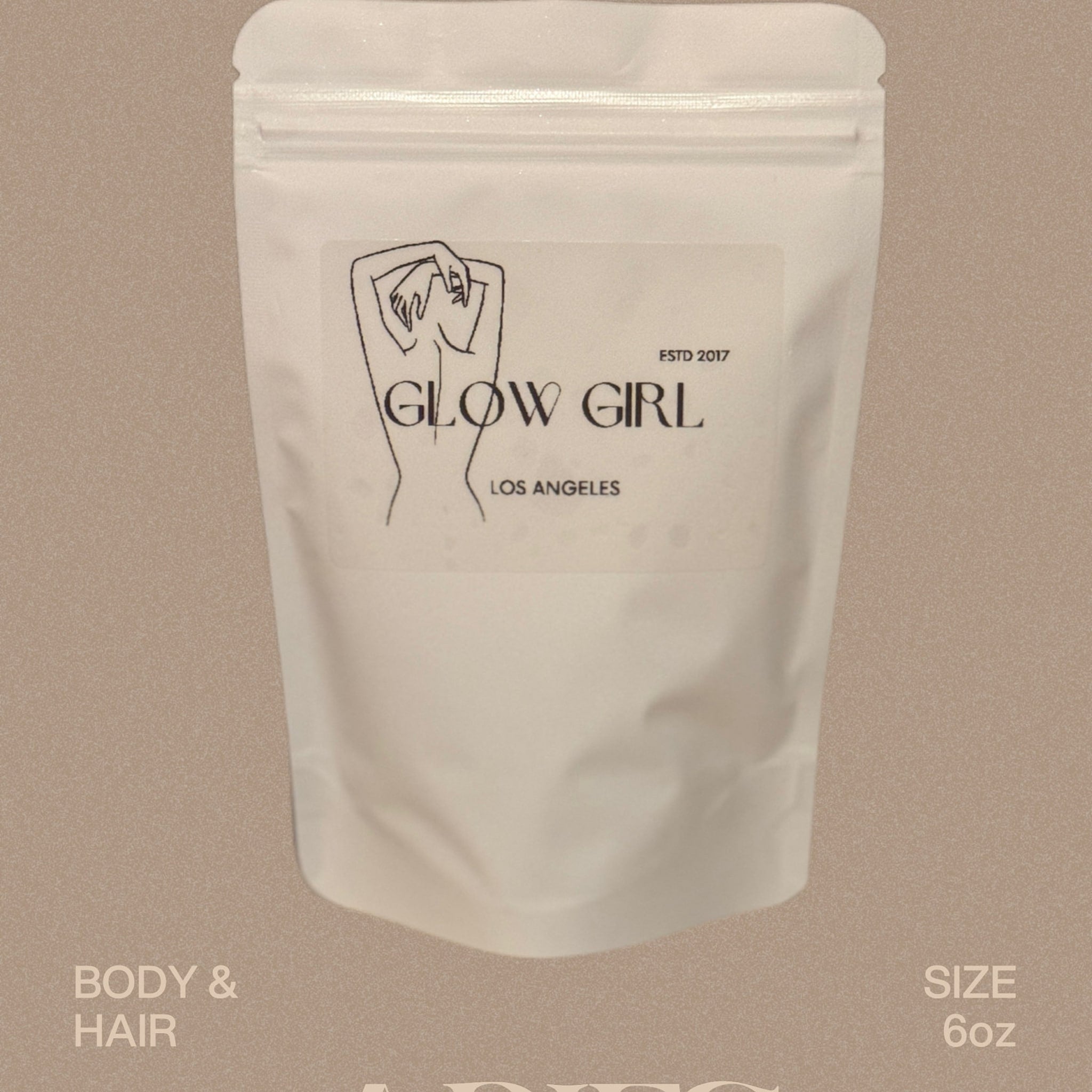 Face powder in white pouch with "GLOW GIRL" text and 6oz size