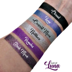Side view of Luna Eyeshadow Palette showcasing twelve vibrant matte and shimmer shades in sleek black compact