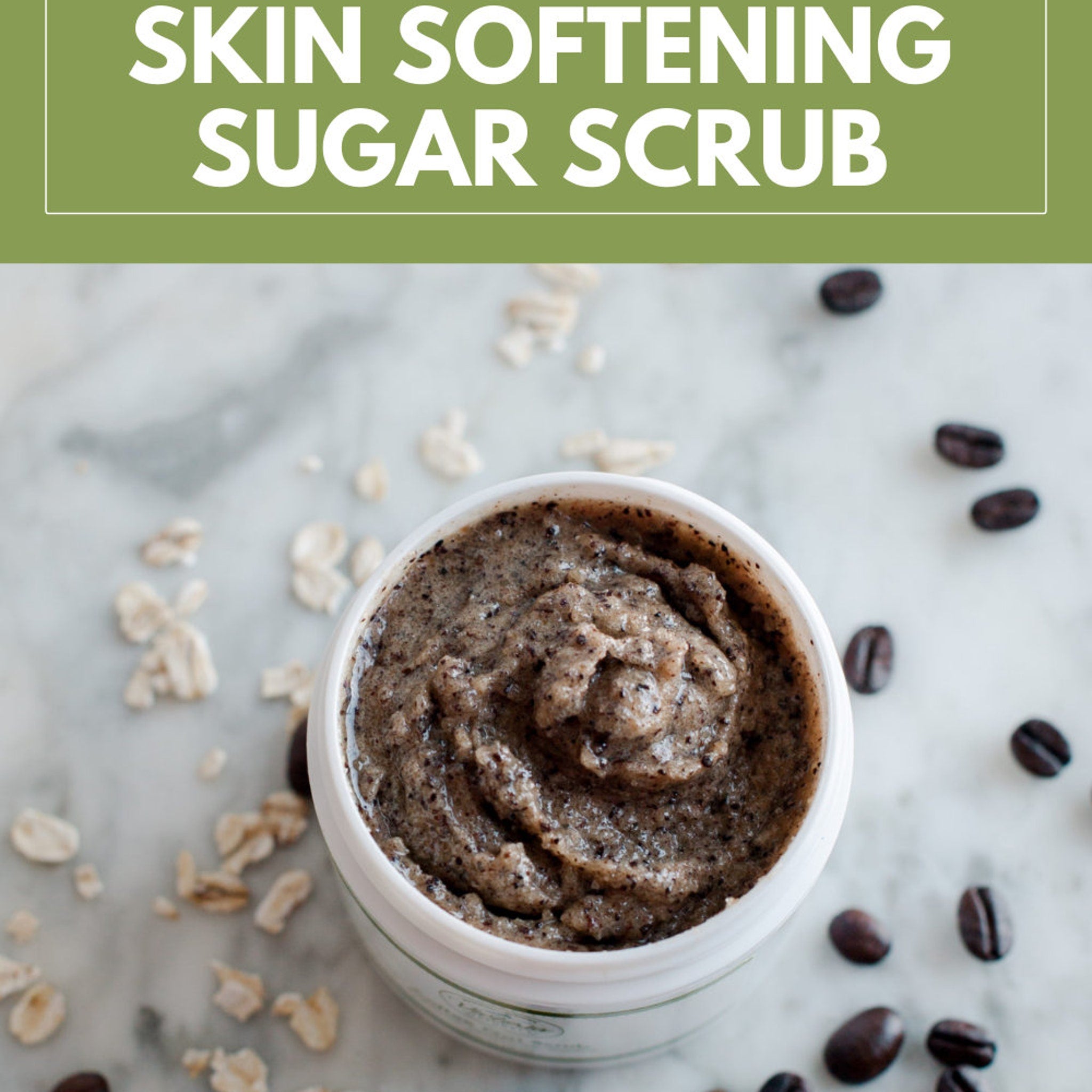 Skin softening sugar scrub in white jar with brown scrub and coffee beans scattered around