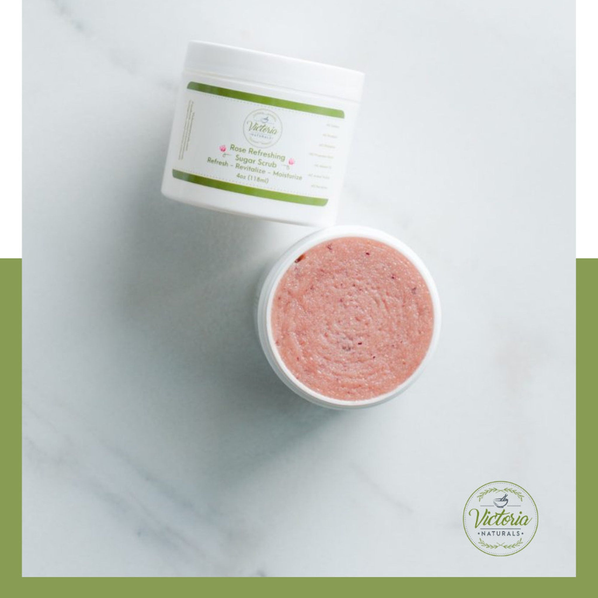 Sugar scrub jar with pink scrub and white container, Victoria Naturals branding visible