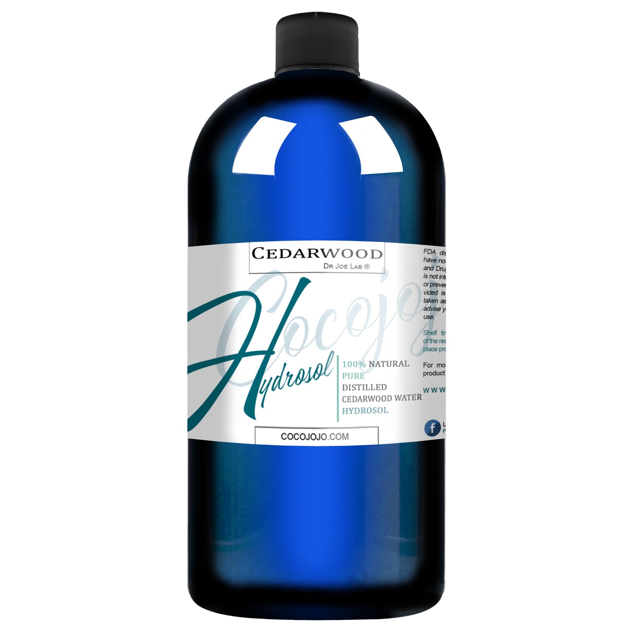 Hydrosol bottle blue glass with black cap and white label, Cedarwood brand name visible
