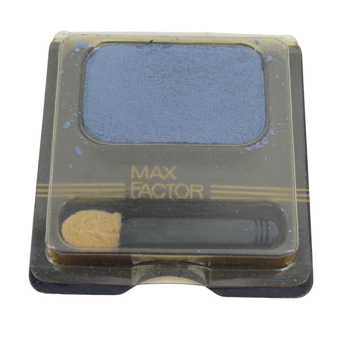 Close-up of Max Factor Vintage Satin Shadow in Star Sapphire 02, a shimmering blue eye shadow in round compact