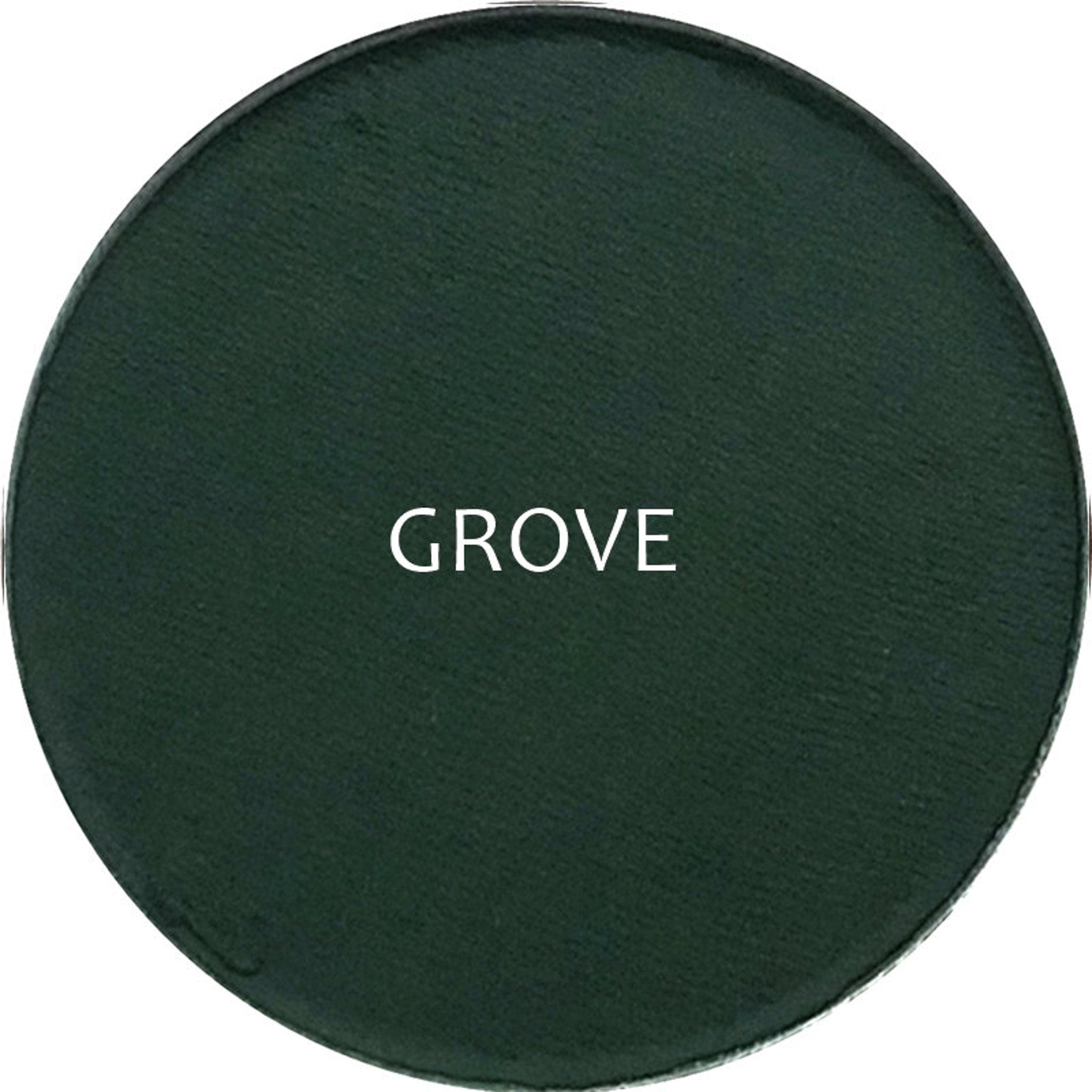 Side view of matte eye shadow compact showing square pan with deep bronze powder