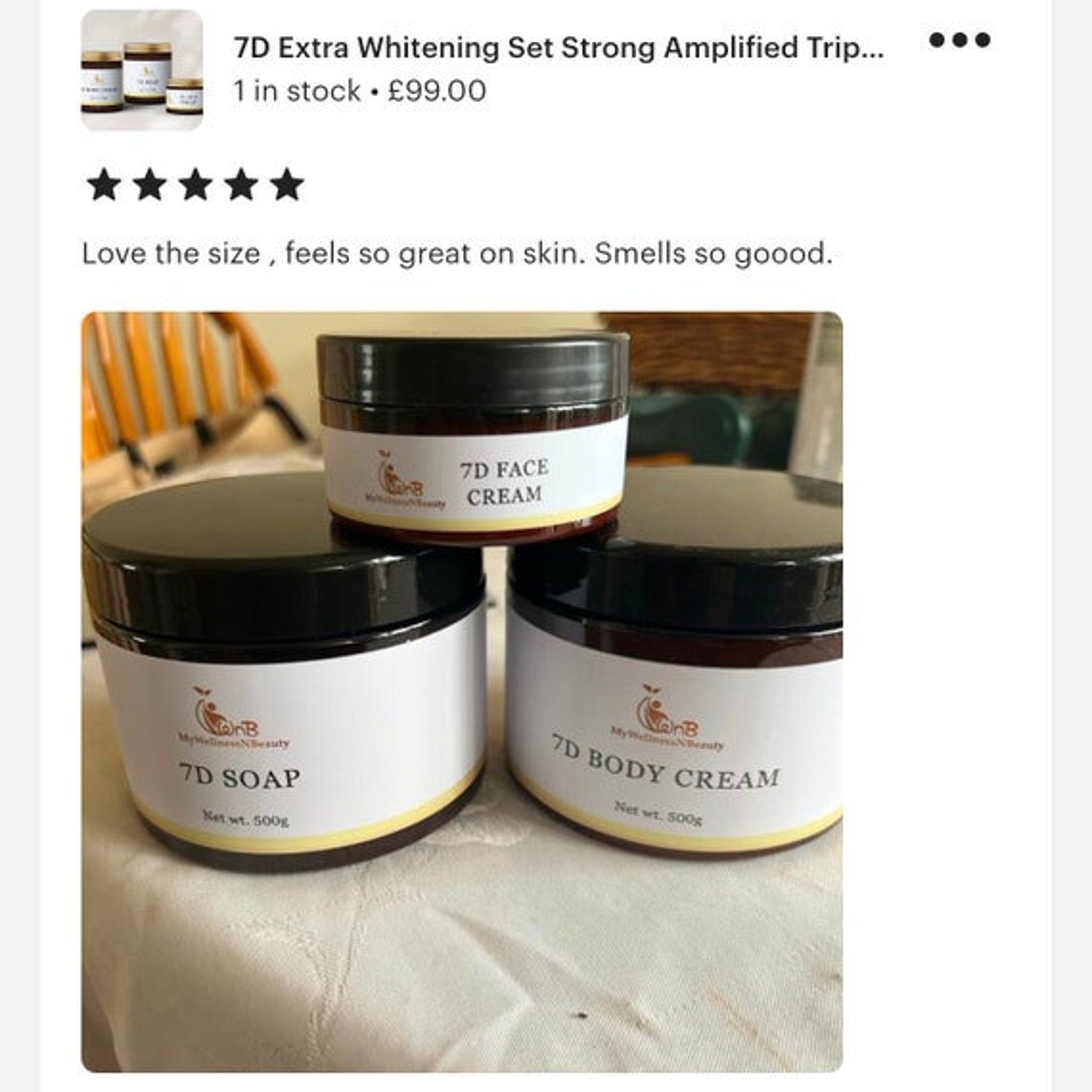 Hand applying a dollop of rich white body cream onto forearm for hydration demonstration