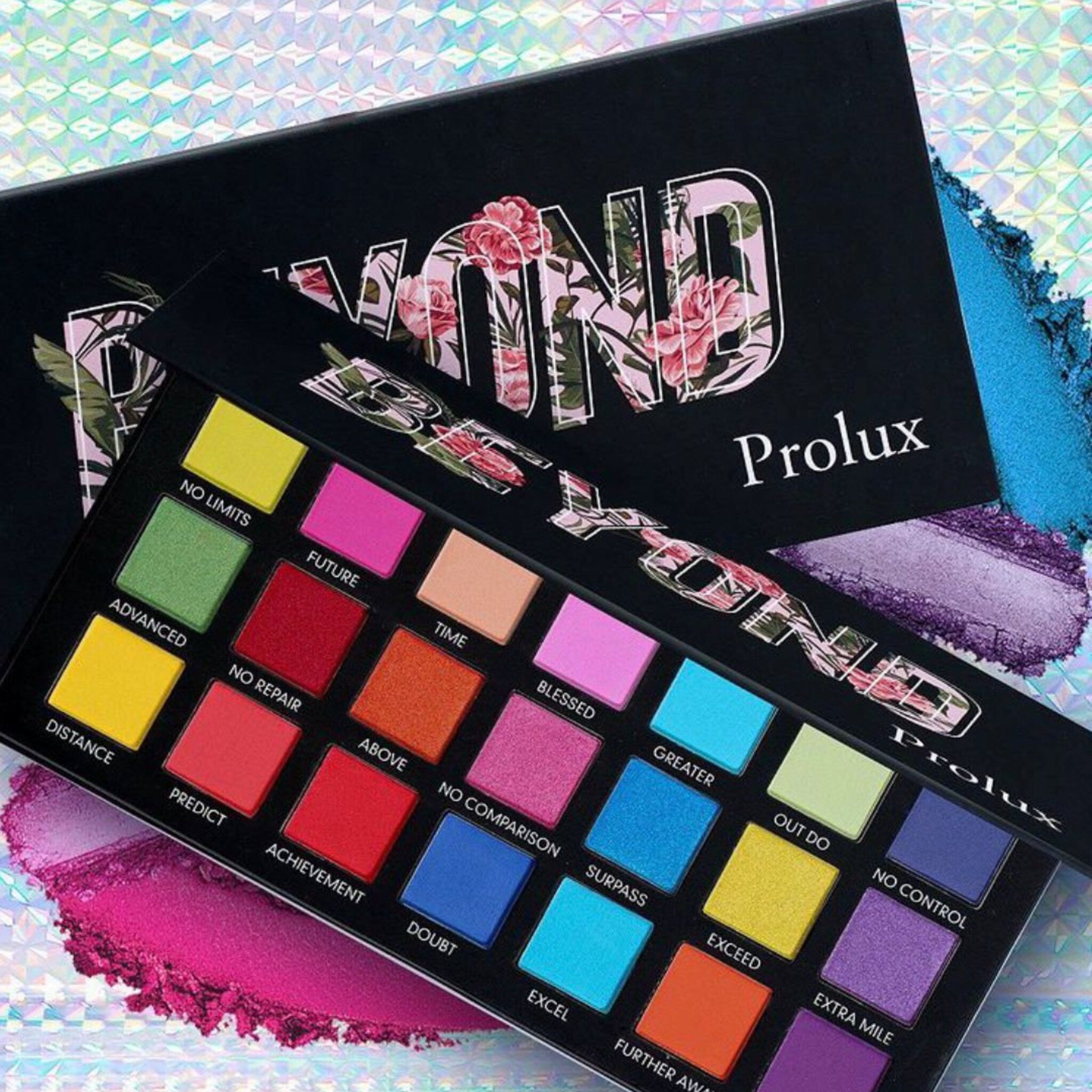 Eyeshadow palette with colorful eyeshadows, floral pattern, and Prolux brand name visible