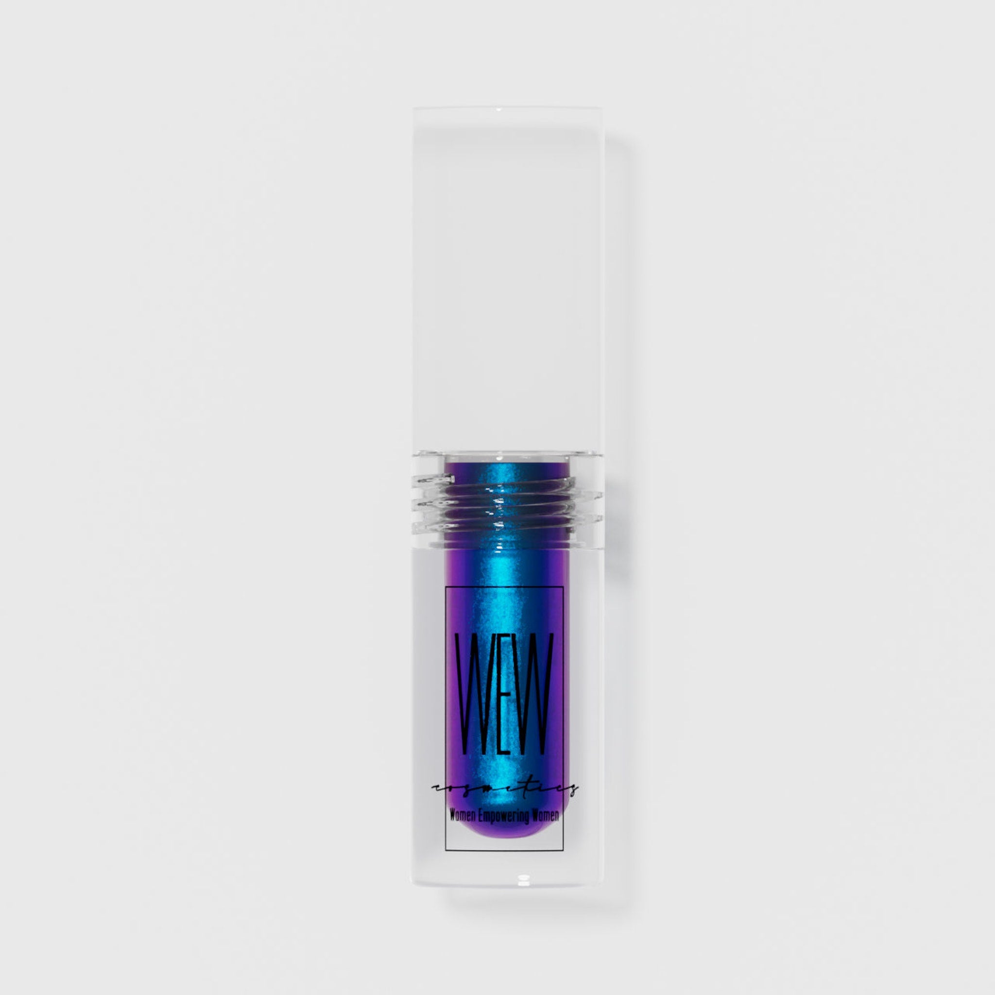 Close-up of shimmering liquid eye shadow in emerald green with metallic finish and doe-foot applicator