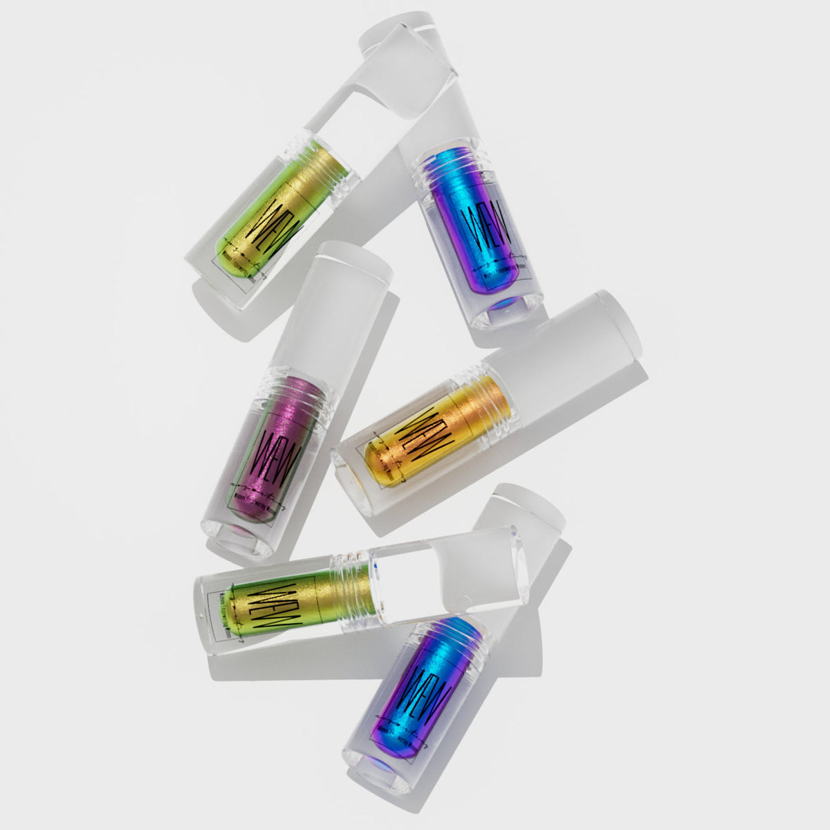 Close-up of Chameleon Liquid Eye Shadows in shifting iridescent hues with sleek dropper packaging