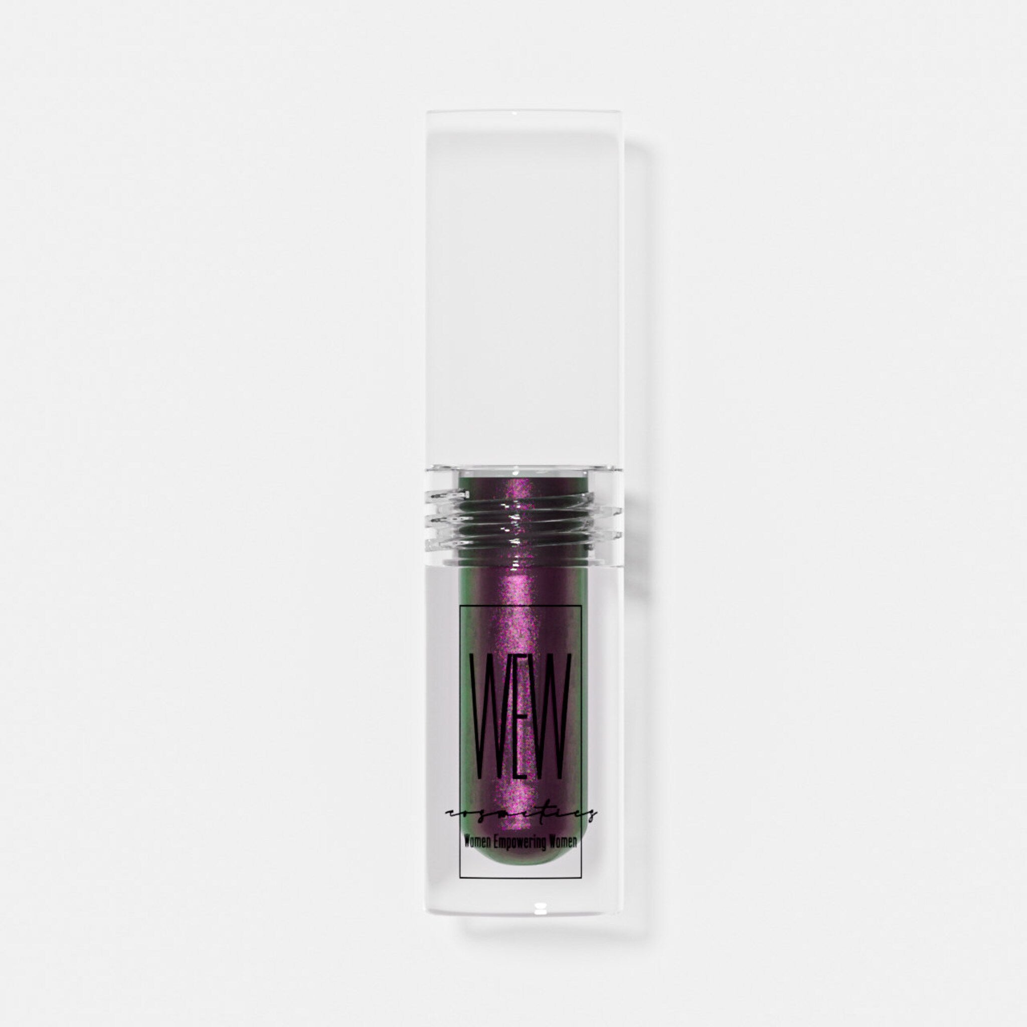 Chameleon Liquid Eye Shadows in sleek glass bottles with gradient metallic caps, displayed on a marble surface.