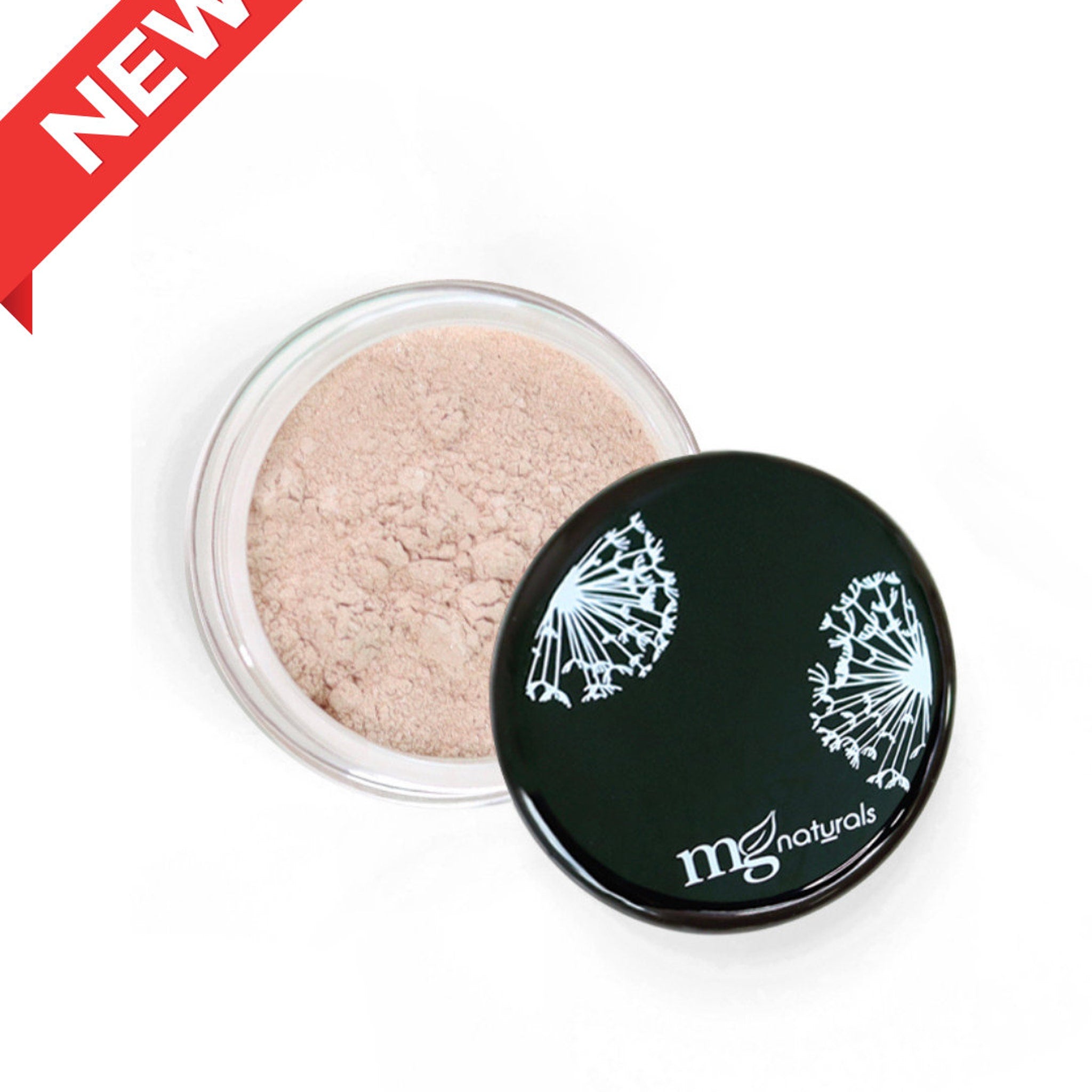 Side view of vegan mineral eyeshadow pan showing pressed powder texture in natural earthy tones