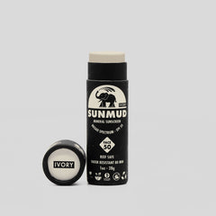 Sunscreen stick with ivory and black packaging, brand name SUNMUD visible, for face protection