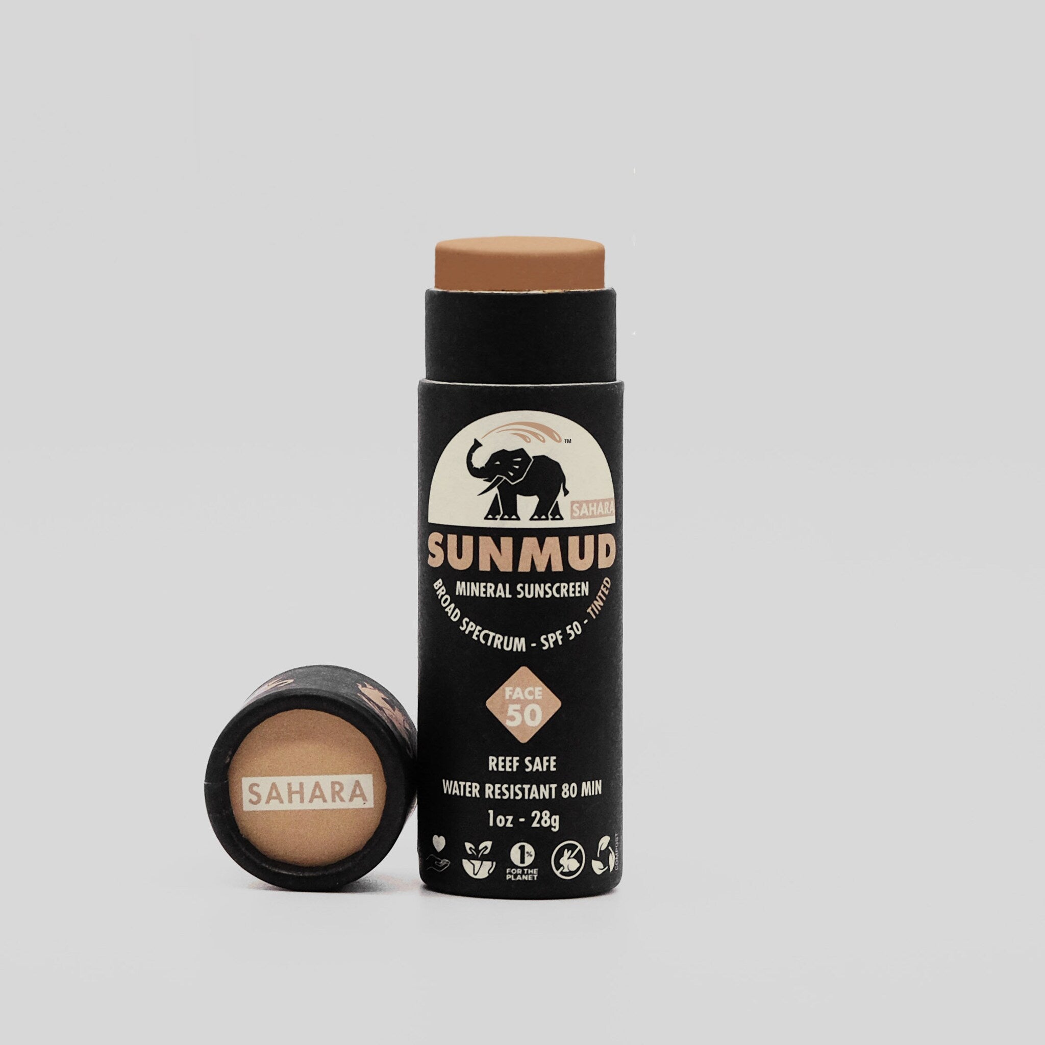 Mineral sunscreen stick with brown tint, black tube, and Sahara brand text visible