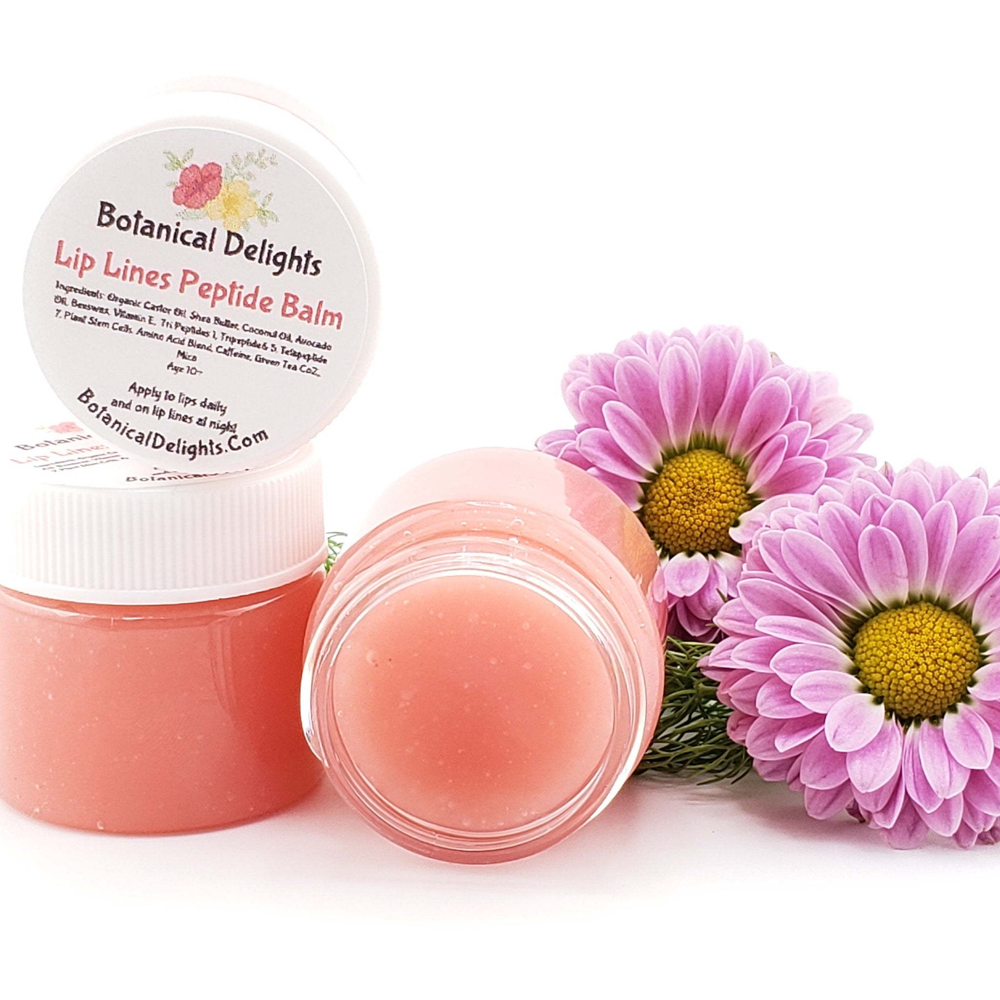 Lip balm, pink gel, clear jar, Botanical Delights label visible